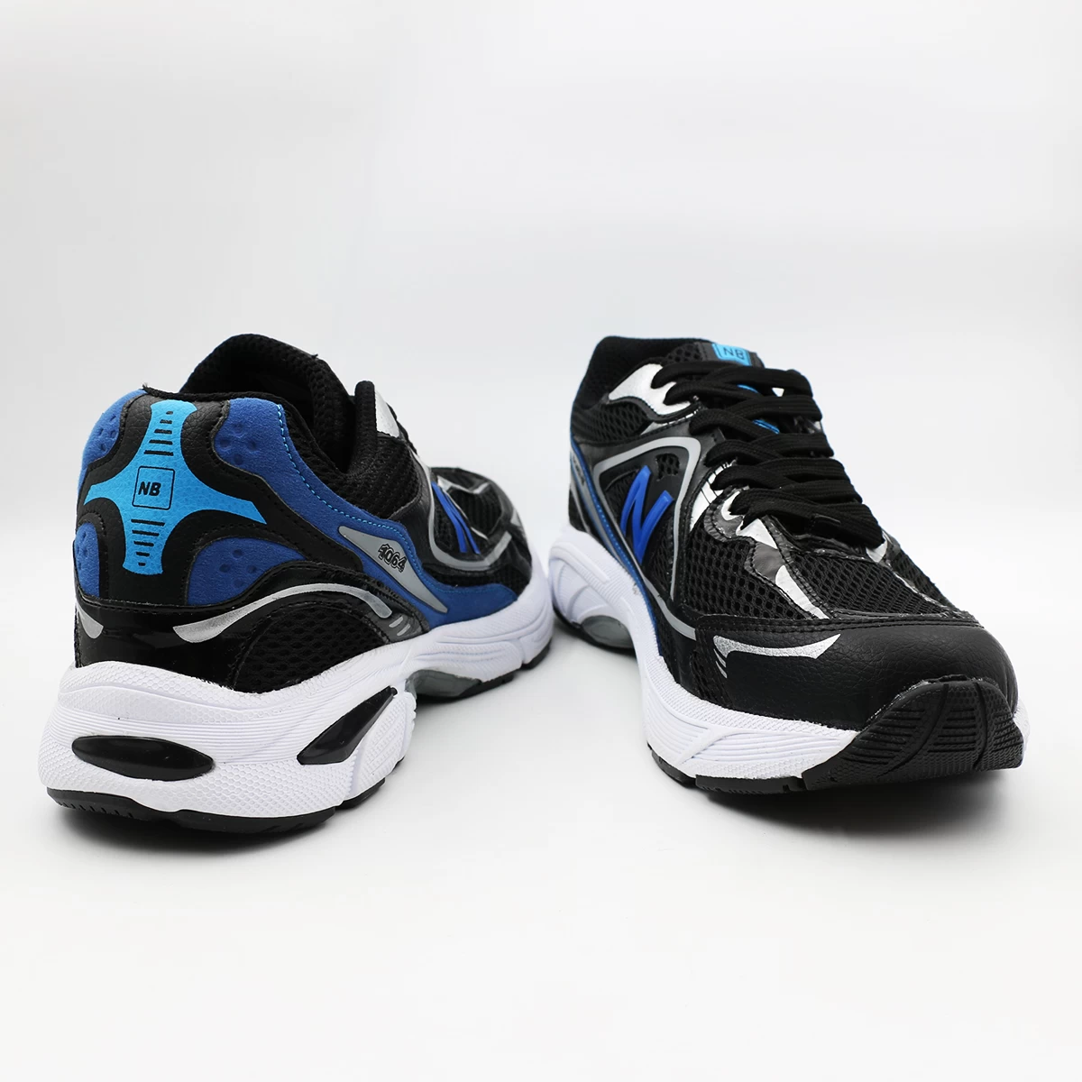 کتانی نیوبالانس مشکی آبی New Balance 1064