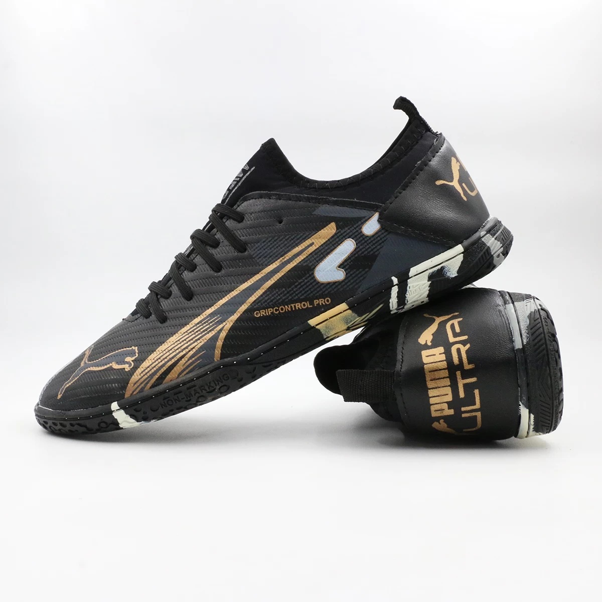 کفش فوتسال پوما اولترا مشکی طلایی Puma Ultra