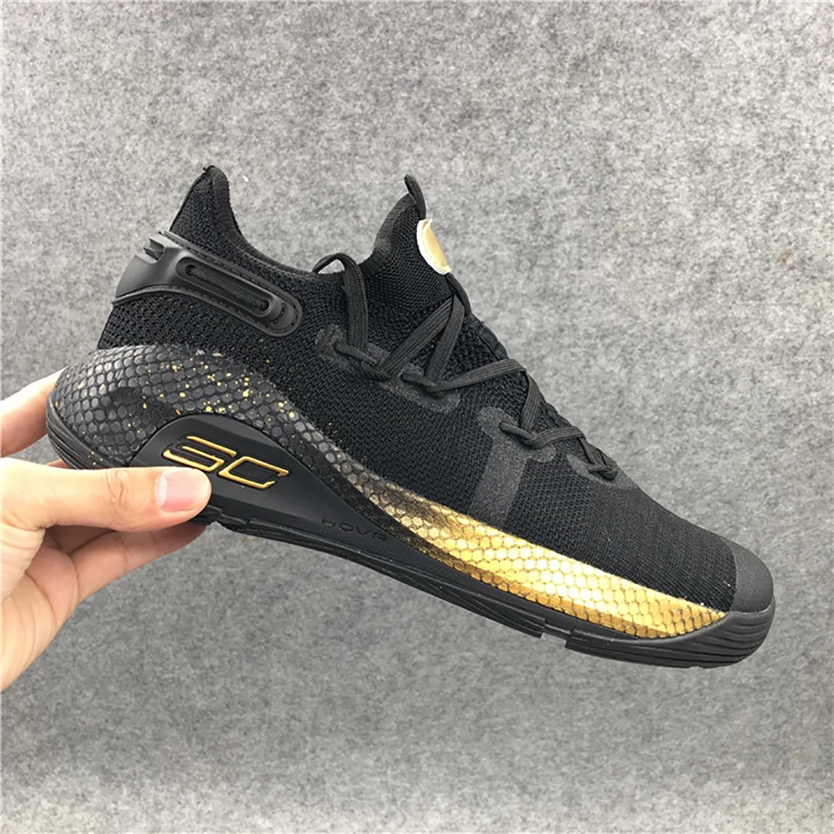 کفش بسکتبال آندر آمور مشکی طلاییUnder Armour Curry 6 Black Gold