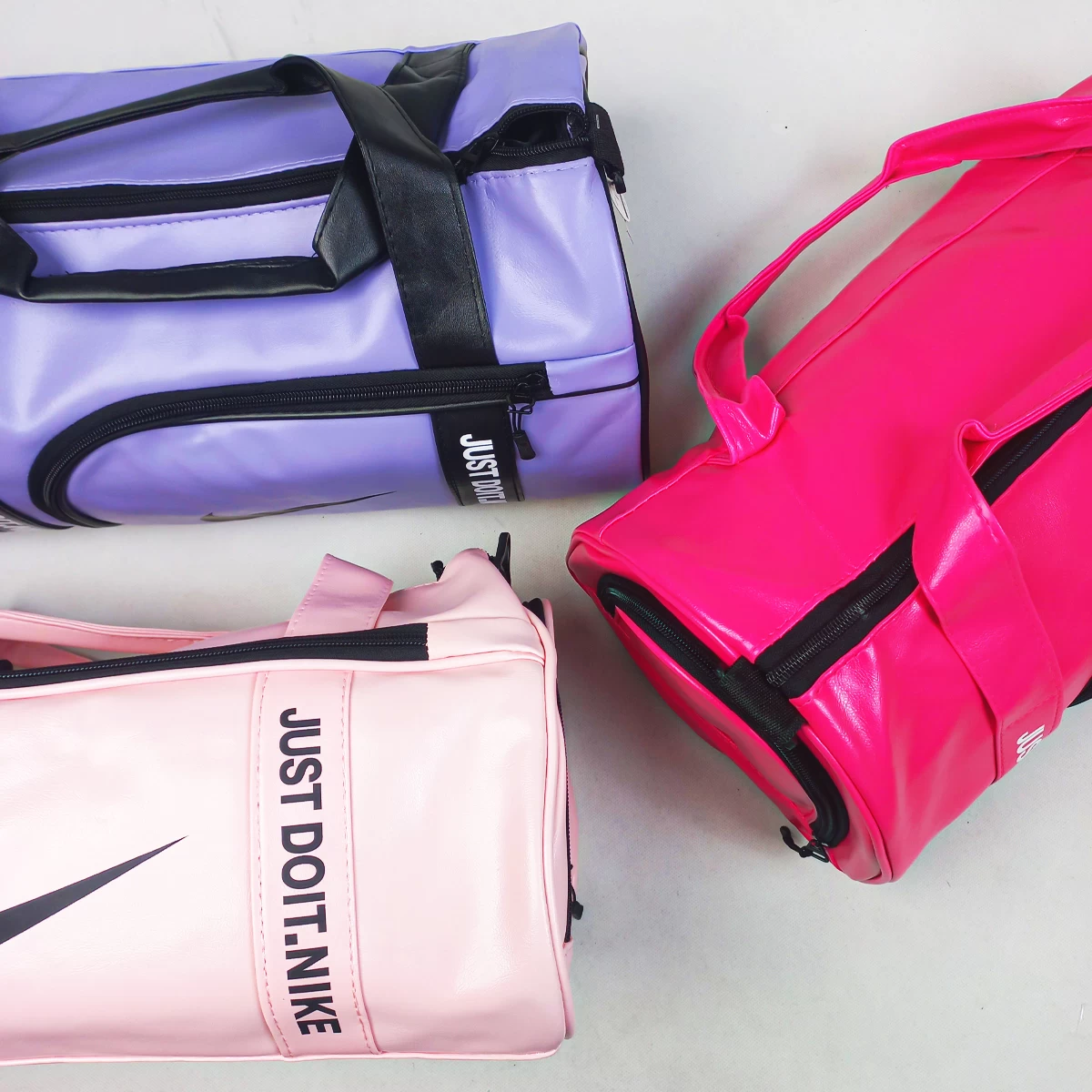 ساک ورزشی جاکفشی دار چرم مدل Nike Just Do It